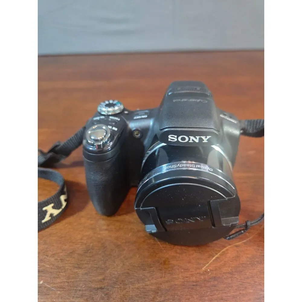 Sony Cyber-shot DSC-HX100V Camera Bundle w/ Tamrac Bag, Cables & Battery